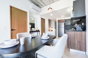 Suite, Balcony, City View | Dining room - Mitt (Monterrey)