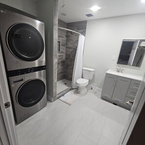 Shower, hair dryer, towels, soap - Two-in-one home in East Houston (Houston)