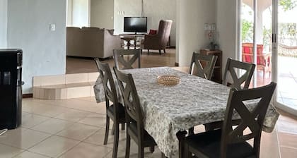 Spacious house in a private condominium with view and access to Acaray Lake.