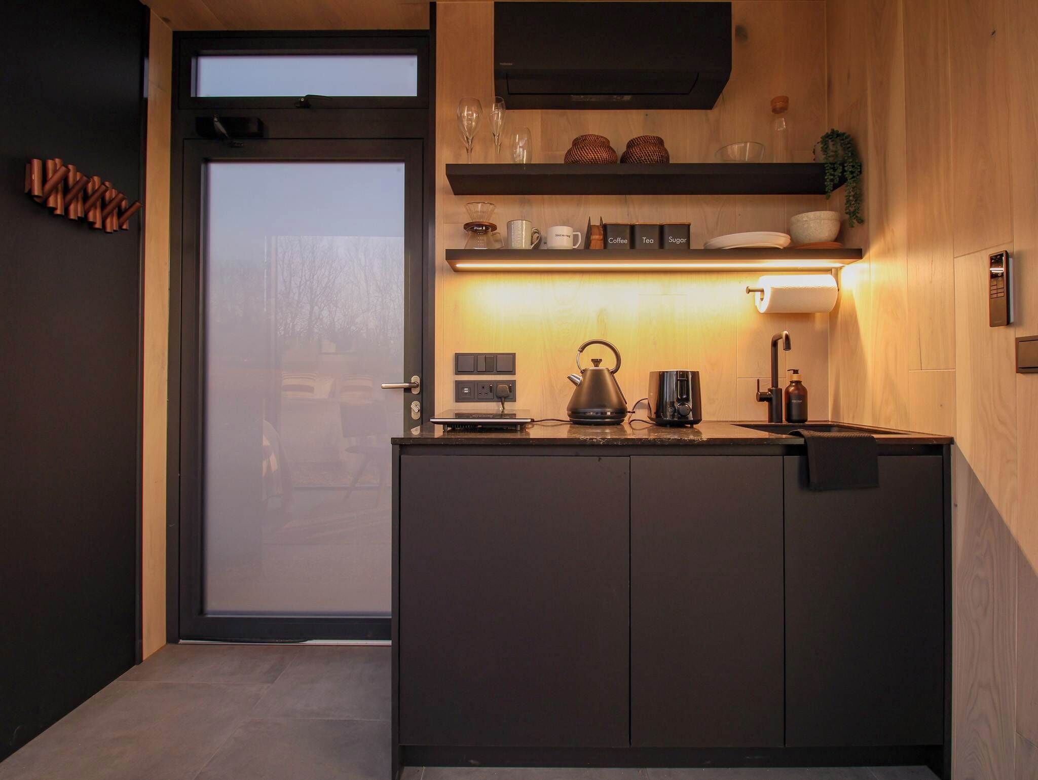Fridge, stovetop, coffee/tea maker, electric kettle