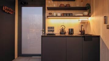 Fridge, stovetop, coffee/tea maker, electric kettle