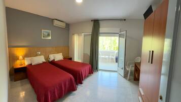 Classic Twin Room, 1 Bedroom, Air conditioning, Mountain View | Premium bedding, down duvets, memory-foam beds, individually decorated