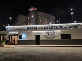 A hotel named 'GALERA DEL MAR' with a reception area and a bar/cafeteria.