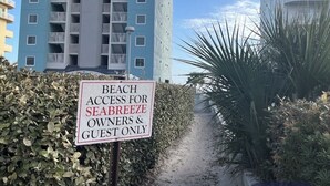 A sign indicating beach access is for seabeeze owners and guests only. - updated 2-bedroom, 2 bath, sleeps 6 family friendly condo. Many extras. (Gulf Shores)