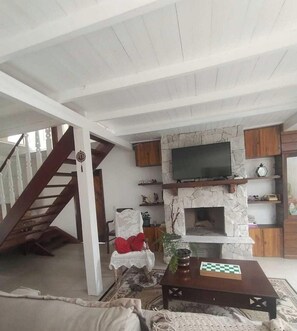Chalet Premium, vue jardin | Coin séjour