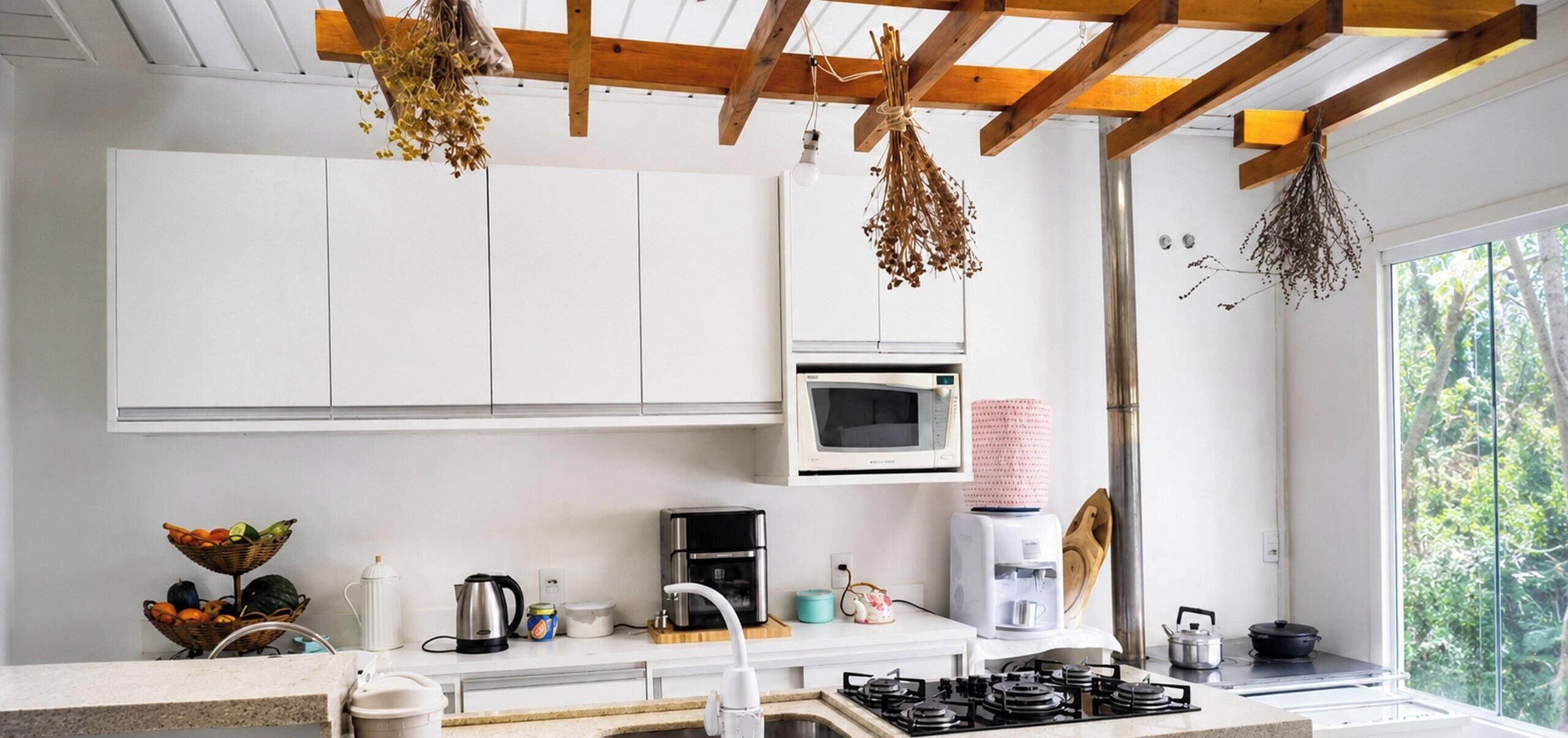 Premium Chalet, Garden View | Private kitchen | Fridge, microwave, cookware/dishes/utensils, dining table