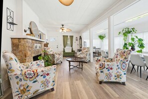 TV, fireplace, books, offices - Riverfront Home with Guest House, Deck and Yard (Melbourne)