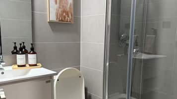 Hair dryer, towels, soap, toilet paper