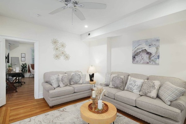 Living room features a comfy full sized sleeper sofa