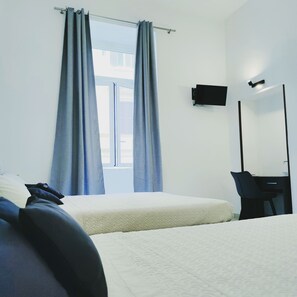 Comfort Quadruple Room | Blackout curtains, iron/ironing board, free WiFi - Bosuites Rome (Rome)