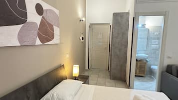 Standard Triple Room | Blackout drapes, iron/ironing board, free WiFi
