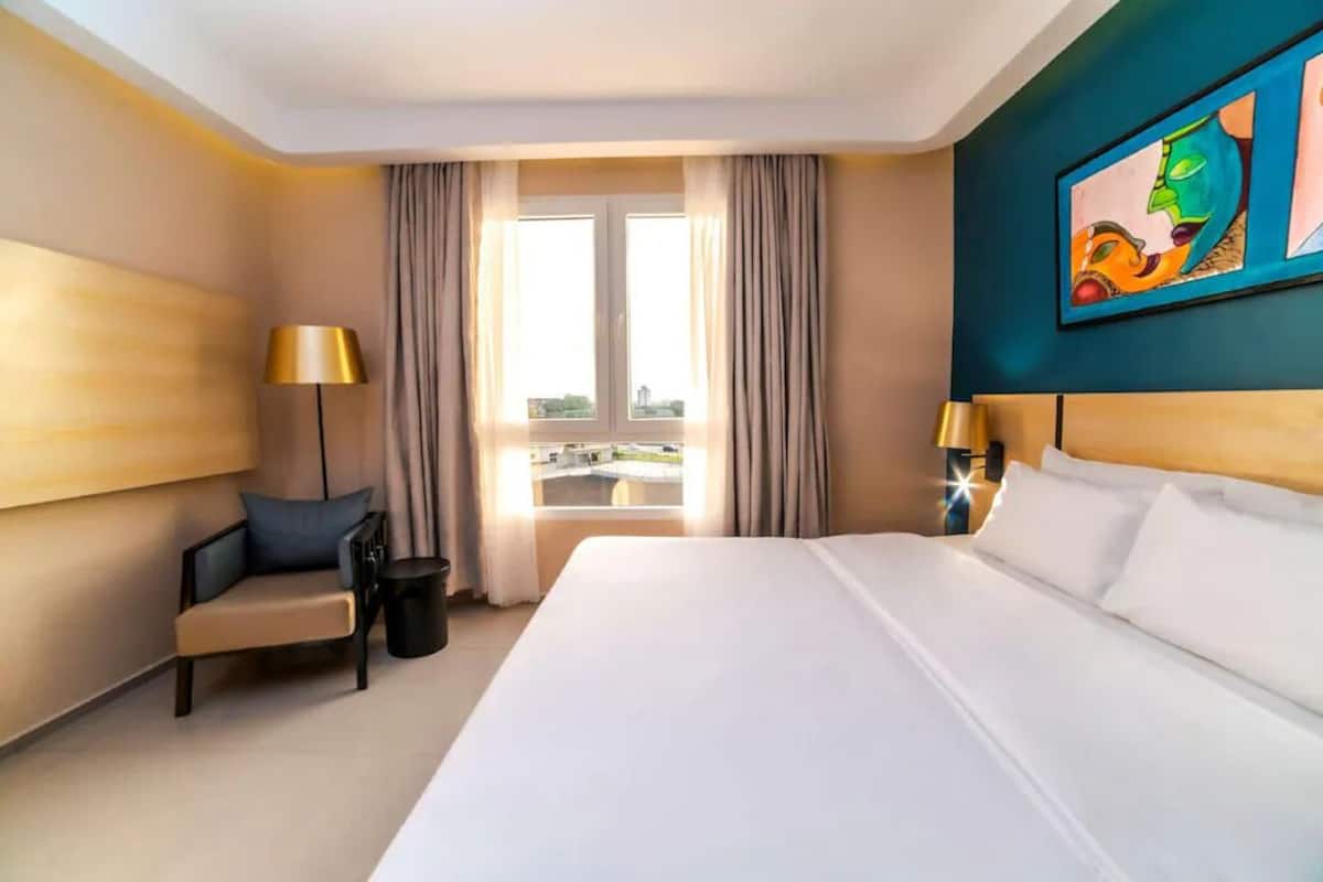 Standard Room, City View | In-room safe, desk, laptop workspace, blackout drapes