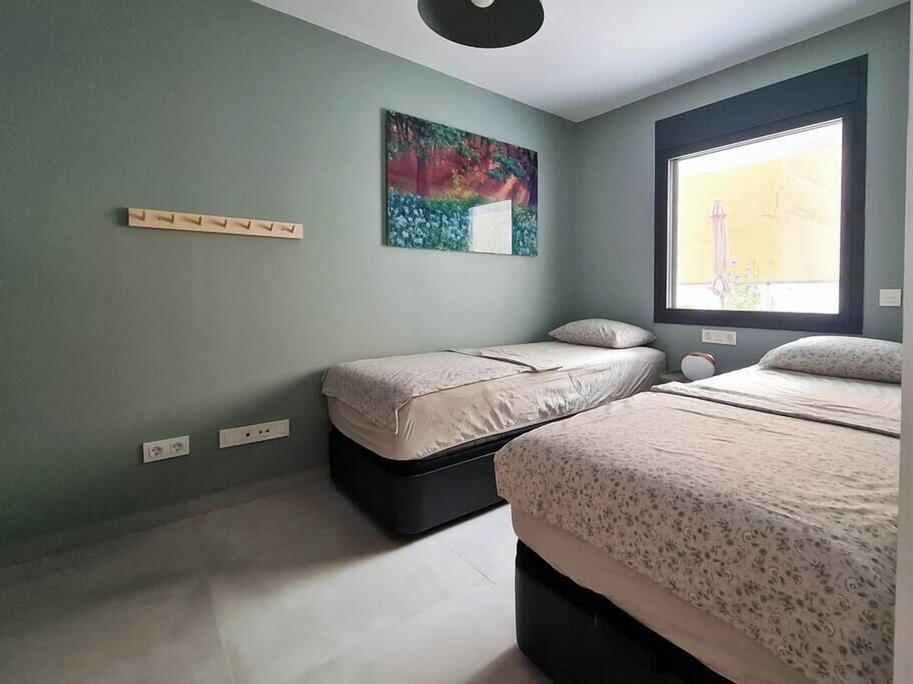 2 bedrooms, desk, iron/ironing board, travel cot