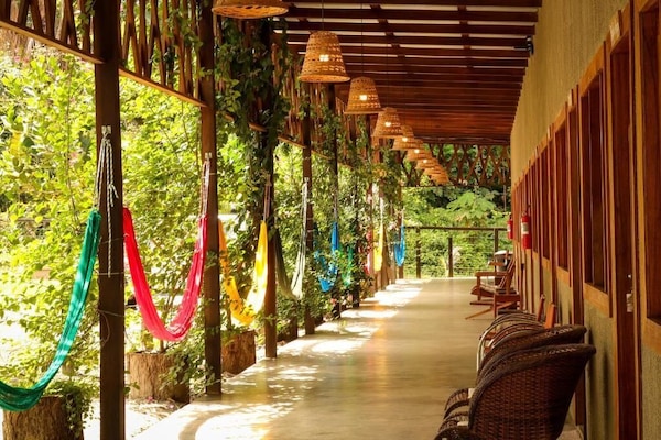 Deluxe Suite, Patio, Garden View | Terrace/patio