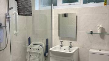 Hair dryer, towels, soap, toilet paper