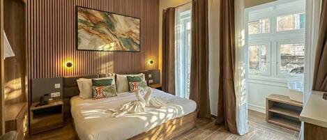 Deluxe Double or Twin Room, Balcony, City View | Minibar, in-room safe, desk, blackout drapes