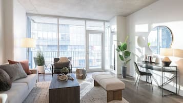 Appartement Deluxe, vue partielle sur le lac | Coin séjour