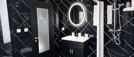 Shower, hair dryer, towels, soap