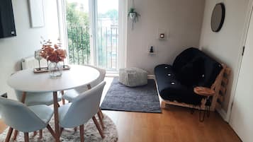 Quadruple Room, 1 Double Bed with Sofa bed, City View | Living area