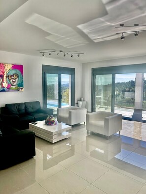 Living area - Stunning contemporary Villa set amongst olive trees. Beautiful scenery (Corfu)