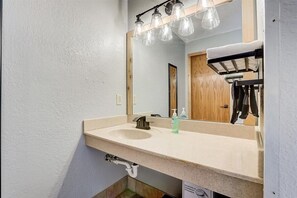 Hair dryer, towels, soap, shampoo