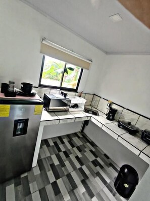 Appartamento Standard, patio, vista giardino | Cucina privata