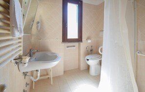 Regadera y secadora de cabello 
