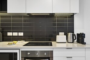 Fridge, microwave, oven, stovetop - 1BR Docklands | Walk to Marvel Stadium + Balcony (Docklands)