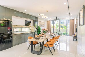 Junior Villa, River View | Private kitchen | Oven, stovetop, rice cooker, cookware/dishes/utensils - Regal Riverside Villas (Đa Nang)