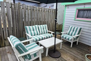 Terrace/patio - Historic cottage with patio, games, walk to beach & dog-friendly fenced yard (Oak Bluffs)