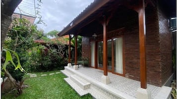 Deluxe-dobbeltværelse - udsigt til have | Terrasse/gårdhave