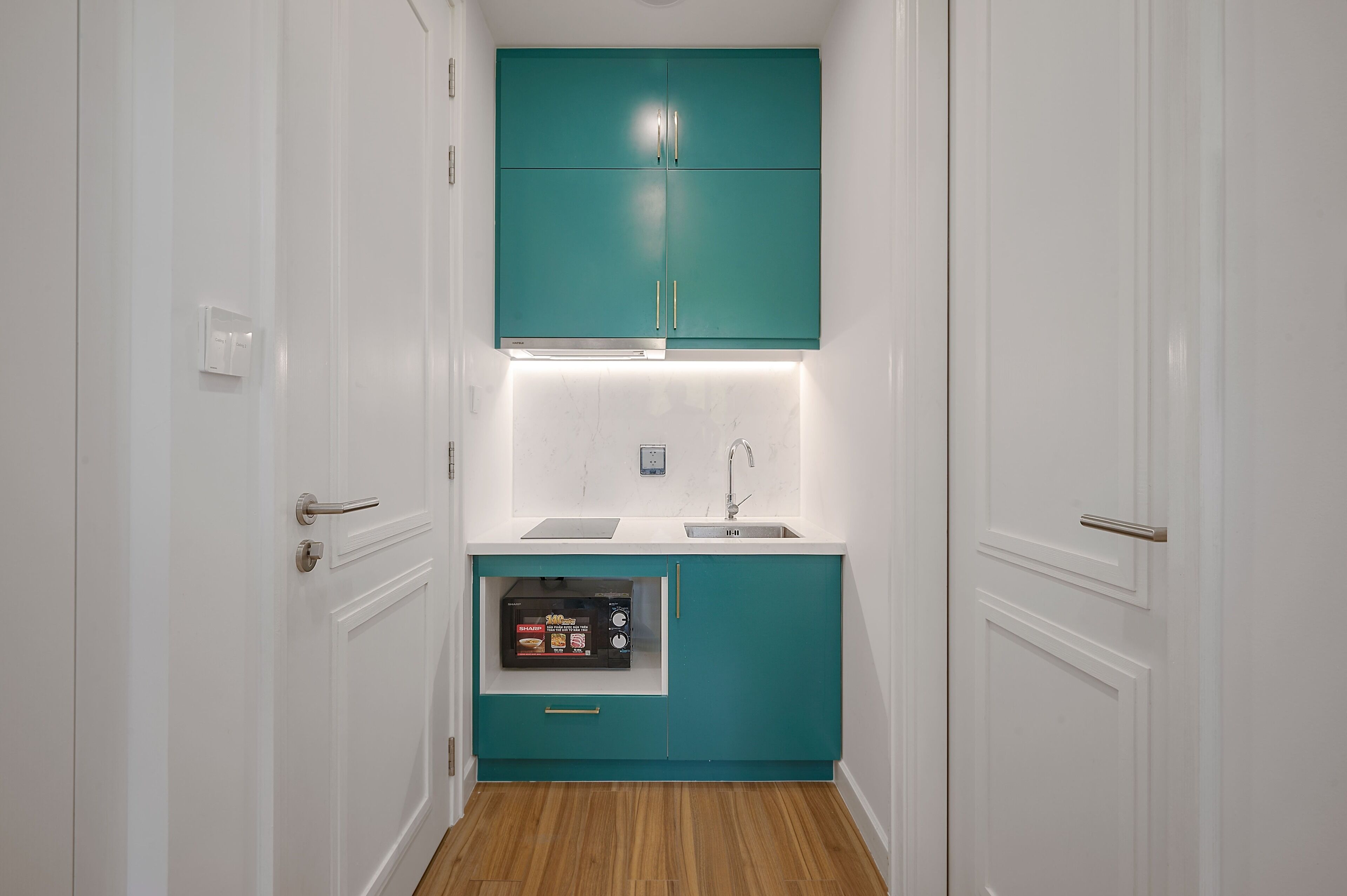 Mini-fridge, stovetop, cookware/dishes/utensils