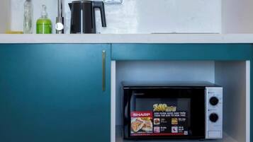 Seaview Fireworks Studio with Balcony | Private kitchen | Mini-fridge, stovetop, cookware/dishes/utensils