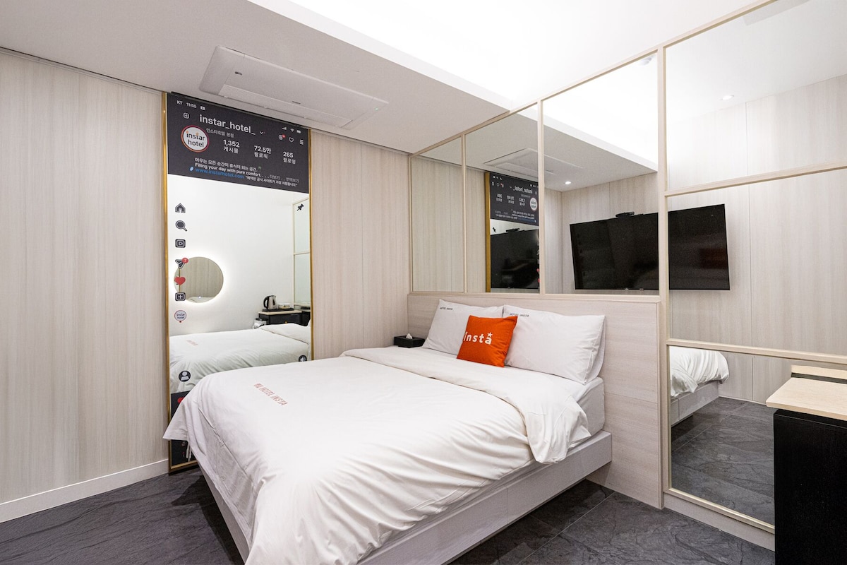 Economy Room (random design assignment) | Premium bedding, down comforters, soundproofing, WiFi (free)