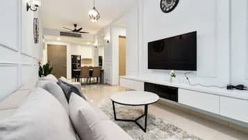 Apartamento galeria, 3 quartos, vista para a cidade | Área de estar