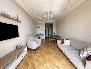 Living area - Playstation 5 + Panoramic City view Apartment (Baku)