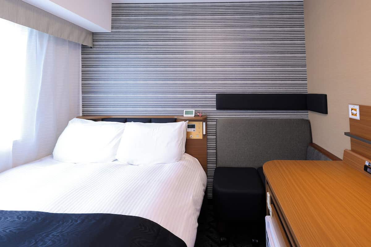 Premium bedding, down duvets, memory-foam beds, desk