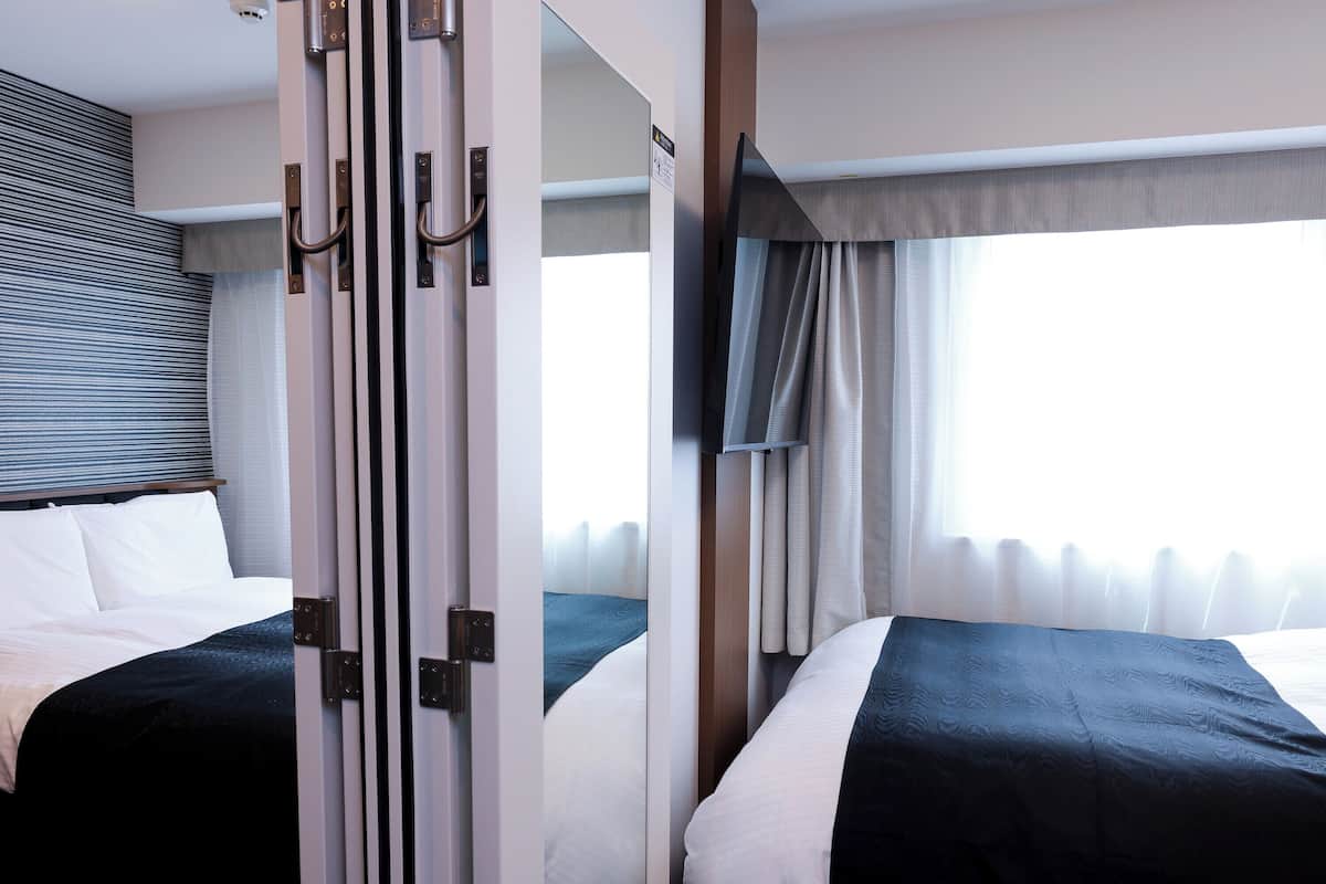 Premium bedding, down duvets, memory-foam beds, desk