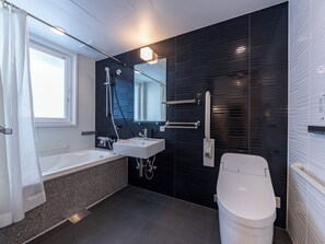 Habitación Deluxe con 2 camas individuales, para no fumadores | Baño | Tina con regadera, amenidades de baño gratuitas, secadora de cabello 