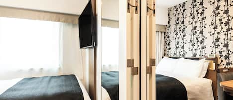 Down comforters, desk, blackout drapes, WiFi (free)