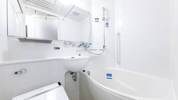 Combined shower/tub, free toiletries, hair dryer, slippers