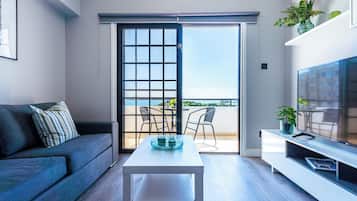 Apartamento, 2 quartos, cozinha, vista para a cidade | Área de estar | Smart TV, Netflix, serviços de streaming
