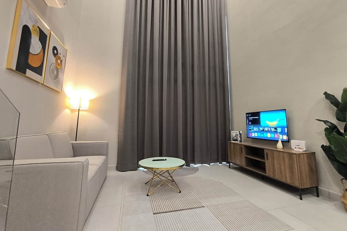 Dúplex, 1 cama Queen size y sofá cama | Área de sala de estar