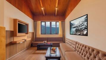 Suite | Living area | 32-inch LCD TV with cable channels