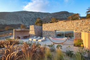 Outdoor dining - New troglodyte villa | Swimming pool with underwater window | Panoramic sea view (Episkopi)