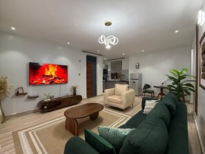 Living area - Luxurious 1 BR Apt in quaint Kampala with power backup. (Kampala)