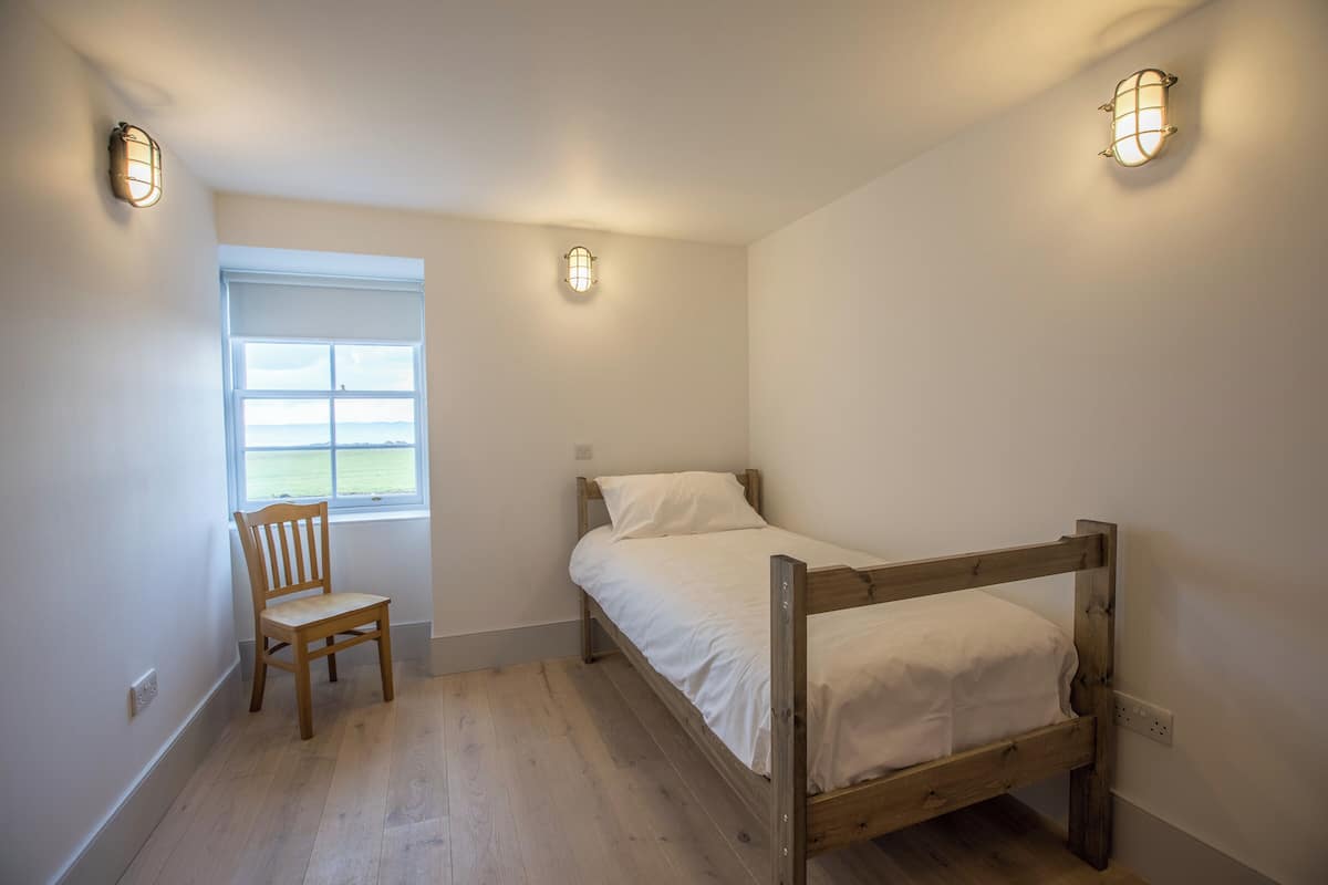 Standaard eenpersoonskamer (Loch Soy) | Een strijkplank/strijkijzer, gratis wifi, beddengoed