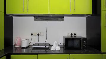 Deluxe Studio, Balcony | Private kitchen