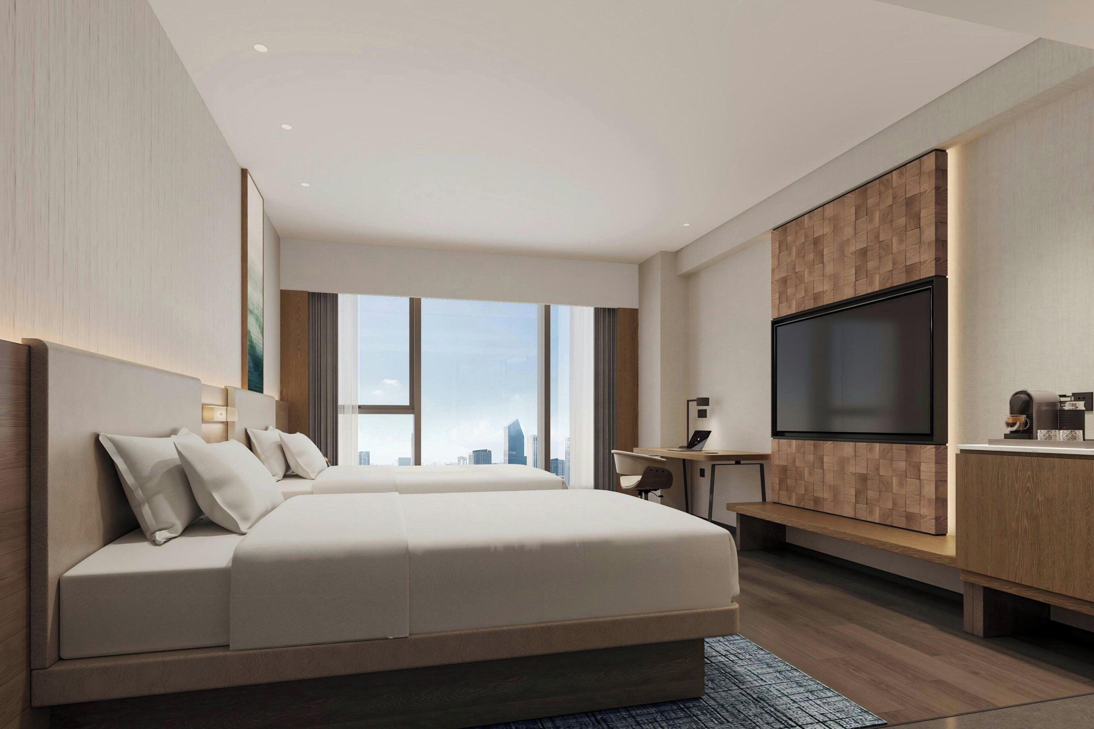 Quarto standard, 2 camas de casal, vista para a cidade | Cofres nos quartos, cortinas blackout, quartos à prova de som