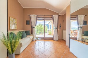 Suite, patio | Coin séjour